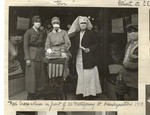 [Red Cross nurses in front of headquarters]