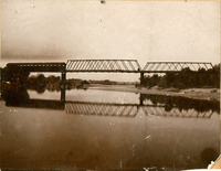 Looking down stream upper Oroville & Thermalito county bridge taken about 1889. First span is covered, on Oroville side. W.R. Parker