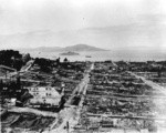 [Panoramic view of city from atop Fairmont Hotel. View looking north from Nob Hill along Mason St. toward North Beach. Alcatraz and Treasure Islands, center; Russian Hill, left]