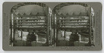 Wool 28. Piano hammer felt sheets about to be pressed in hydraulic steam press (note taper of sheets). Calif., 142