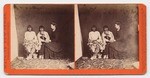 [American Indian women and white woman seated in studio]