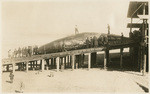 [Whale on pier as part of whaling operation]