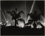 [Exterior general view of city lights Hollywood Boulevard from hills at night]