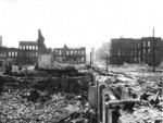 [Ruins and rubble along Dupont St. (later Grant Ave.), looking south. Tops of Call Building and St. Mary's Church barely visible, center]