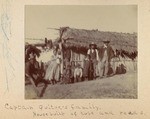 Captain Quitoc's family. House built of tule and reeds