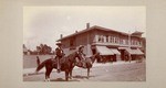 [View of two caballeros on horseback]