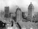 [Intersection of Geary, Kearny, Market and Third Sts. during reconstruction. Mutual Savings Building, center; Call Building, right]