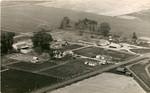 [Aerial view of farm]