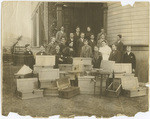 [Unidentified group picture with many wooden boxes]