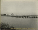 Potato and onion loading platform with warehouse in distance