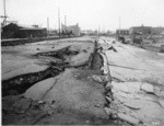 [Subsidence along street and sidewalk. Capp St.]