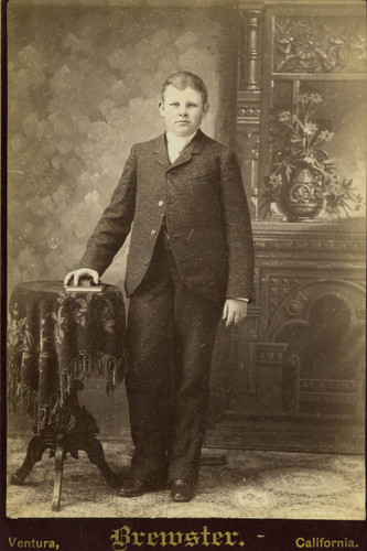 Portrait of unidentified young man, standing