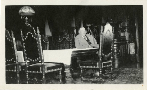 Photograph, Man seated at table