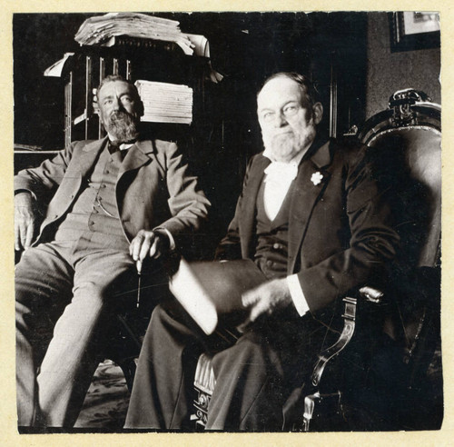Judge Lemuel Clarke McKeeby and second man, seated