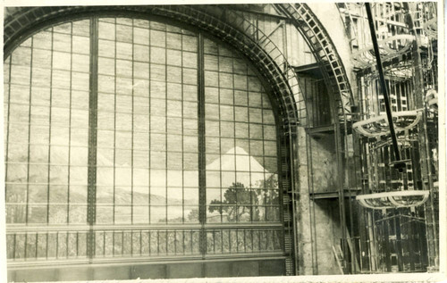 Photograph, unidentified window with mural of mountain scene