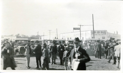 Photograph, city street in Mexico, with a fleet of cars