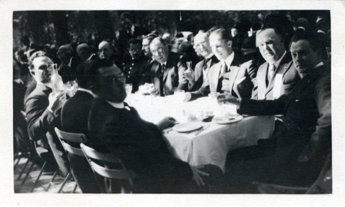 Closeup of Los Angeles Chamber of Commerce representatives seated at dining table