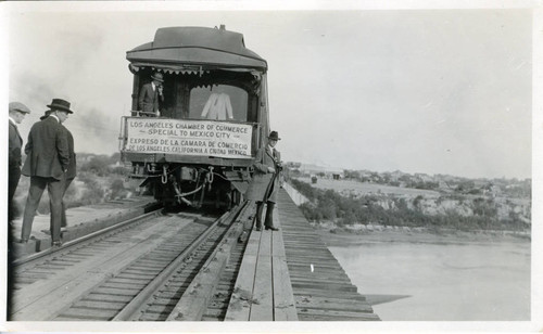 Photograph, train en route to Mexico City stopped on bridge