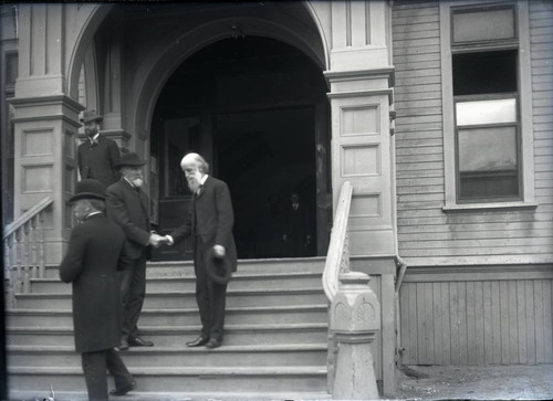 Lyman Abbott on the steps of Holmes Hall
