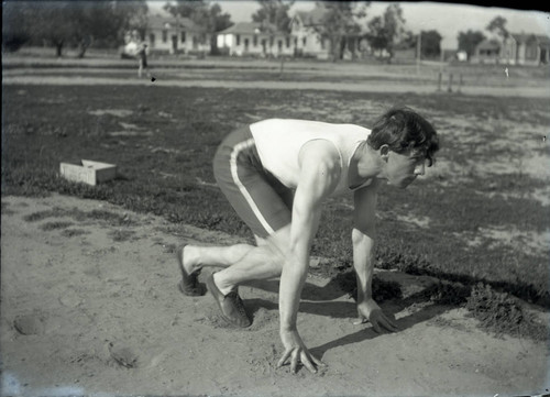 Track and field athlete starting