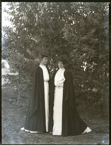 Edith Parker and Alice Marston in cap and gown