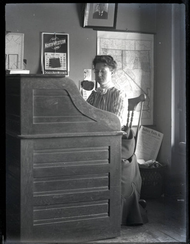 Agnes Taylor at desk