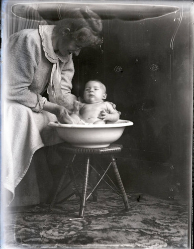 Baby in washbowl