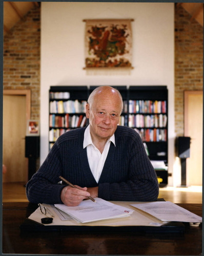 Charles Handy, color photo at desk