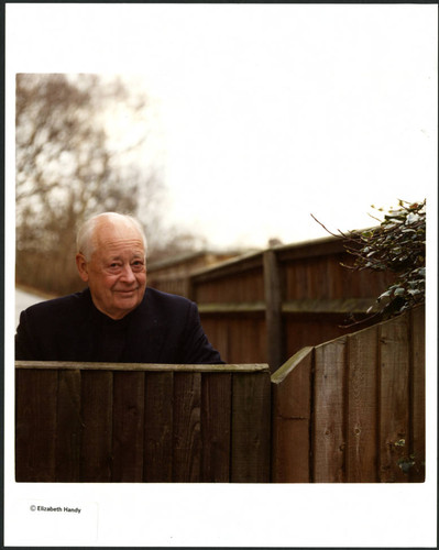 Charles Handy, outside fence color photo