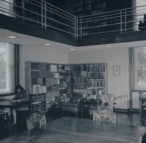 Reading inside Honnold Library