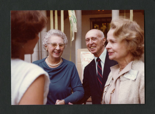 Dorothy Drake smiling with colleagues at Denison Library's 50th birthday celebration, Scripps College