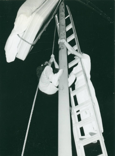 Mattress suspended from lamppost, Harvey Mudd College