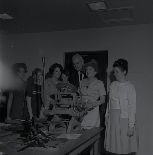 Faculty and students with printing equipment, Scripps College