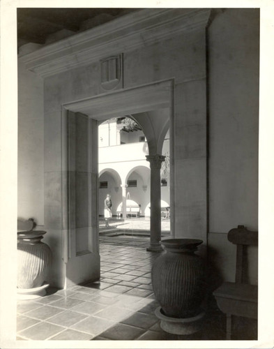 Student by fountain in Eucalyptus Court, Scripps College