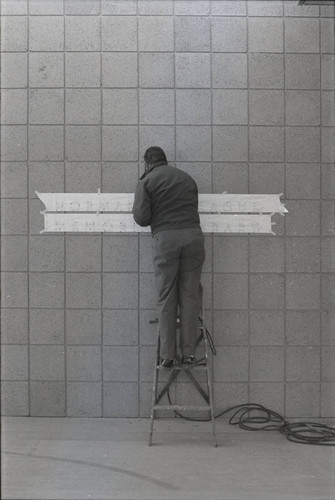 Sprague Library sign installation, Harvey Mudd College