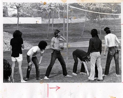 Students playing football. Pitzer College