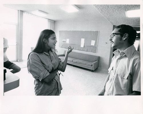 Students talking in a dorm lobby, Pitzer College