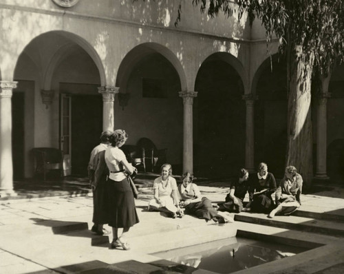 Students by fountain at Eucalyptus Court