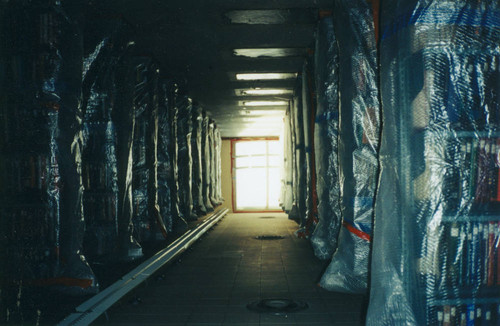 Book stacks wrapped in plastic