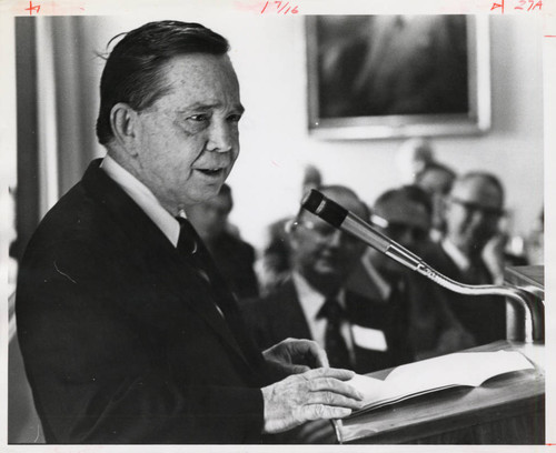 Carl Albert standing behind a podium, Claremont McKenna College