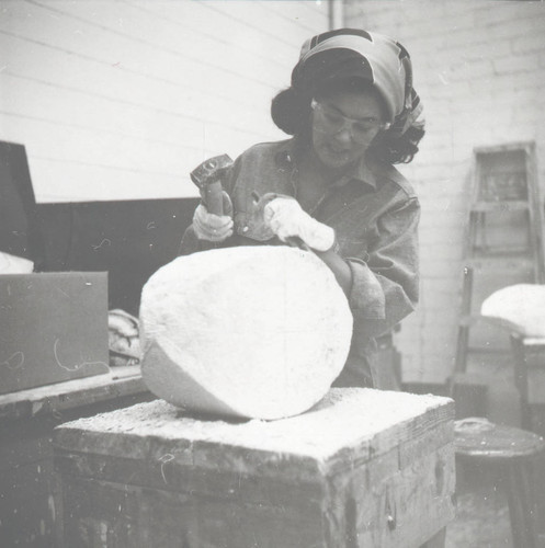 Woman carving, Scripps College