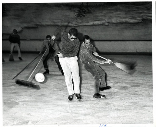 Students playing broomball, Harvey Mudd College