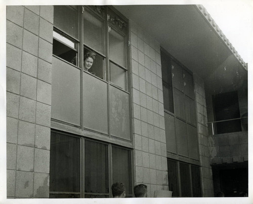 Student in dorm window, Harvey Mudd College