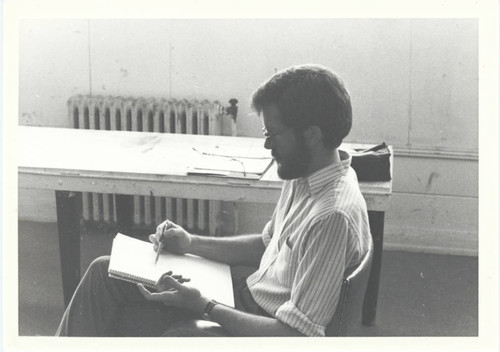 Man with sketchbook, Scripps College