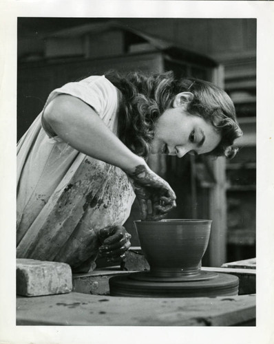 At the pottery wheel, Scripps College