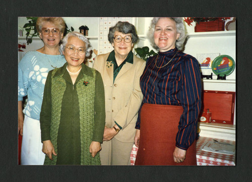 Four librarians at the staff Christmas breakfast in 1986, Scripps College