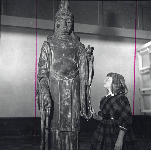 Young girl with statue, Scripps College
