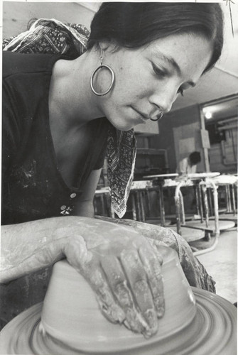 Woman with pottery wheel, Scripps College