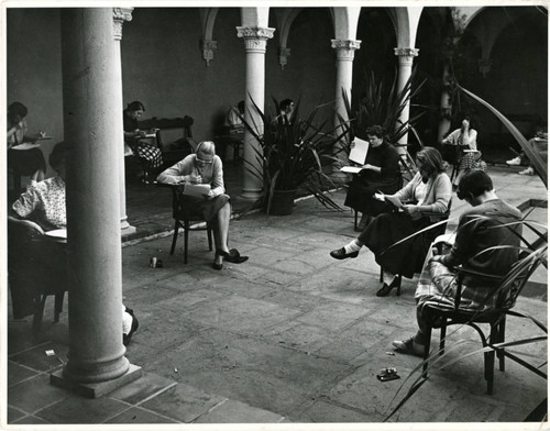 Scripps College students taking exams in Eucalyptus Court