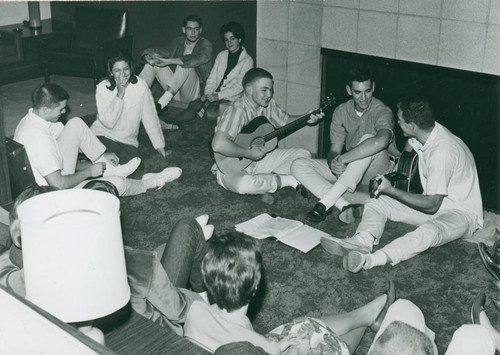 Students singing in Platt Campus Center lounge, Harvey Mudd College